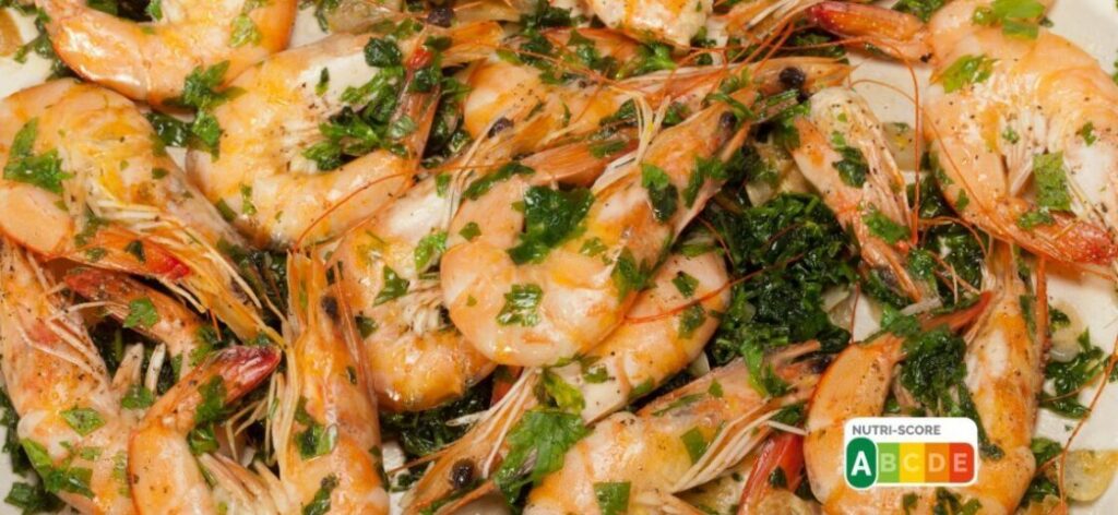 Crevettes sautées, fondue de poireaux, Kiri® et quinoa